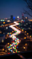 A vibrant, nocturnal cityscape view showcases a mesmerizing pattern of blurred car lights, creating a dynamic spiral design against a backdrop of city lights.
