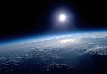 Earth seen from space, a bright sun above the atmosphere