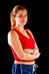 Young and beautiful woman at studio with black backgound