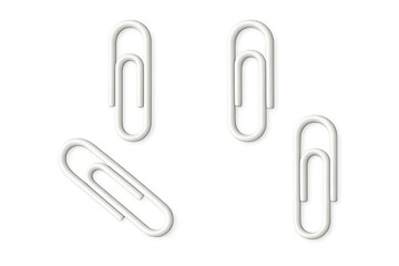 Obraz premium White paperclips dropping randomly, casting soft shadows on clear surface, minimalist design element