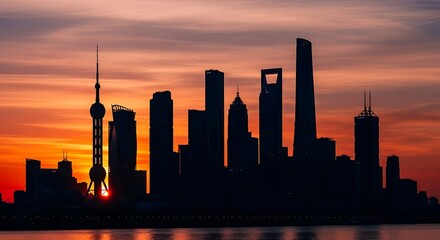 Silhouette of a bustling city skyline at sunrise, showcasing towering structures against a vibrant orange and red sky.