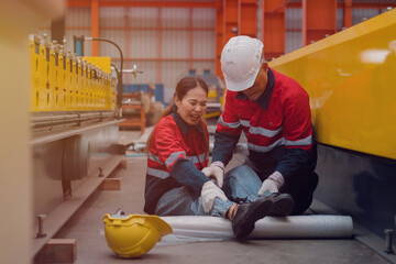A female worker had an accident that injured her leg in a metal sheet factory.