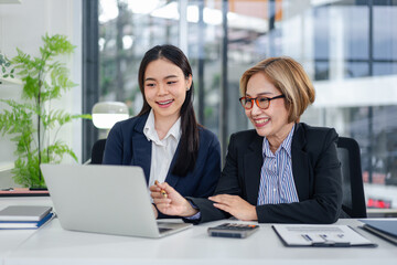 Business Women Teamwork Collaboration in Modern Office Enjoying Success Adult and Young Professionals Working Together Discussing Career Opportunities
