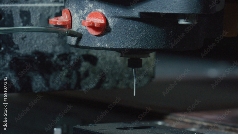 Poster close up view of a cnc milling machine cutting through wood, highlighting the precision and automati