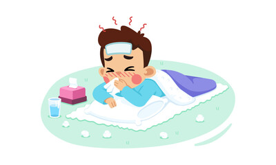 A sick child lying in bed with a cold compress on his forehead, blowing his nose.