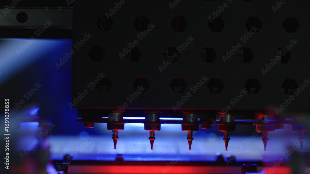 Poster automated industrial 3d printer creating an object layer by layer with plastic filament, illuminated