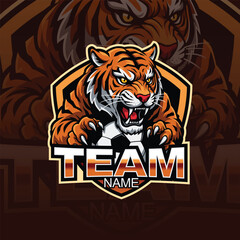 Tiger logo mascot for gaming logo. tiger holding a soccer ball for football team or club