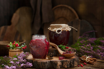 Homemade jam from mountain cranberries, lingonberries, crowberries, fox berries