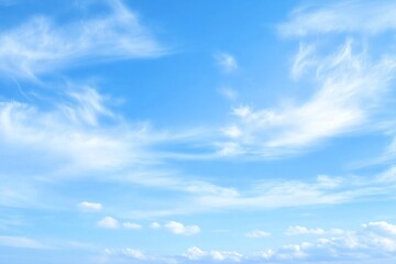 Naklejka premium Breathtaking Wide Shot of an Expansive Blue Sky Filled with Beautiful Cloud Formations, Soft Diffused Light and Serenity Make This Image Perfect for Tranquil Backgrounds or Atmospheric