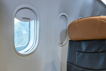 Empty airplane cabin with leather seats