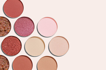 Cosmetics texture pattern, Warm vivid colored eye shadow makeup palette, round eye powder swatches. Female cosmetic and beauty products, aesthetic minimal beauty photo, colorful eyeshade, top view