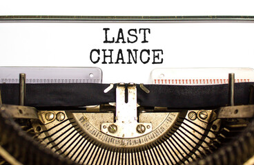 Last chance symbol. Concept word Last chance typed on beautiful old retro typewriter. Beautiful...