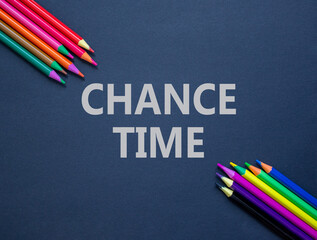 Chance time symbol. Concept word Chance time on beautiful black paper. Colored pencils. Beautiful...
