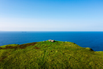 Aerial view of The Moytoge Head lookout post near Keem Beach, Ireland