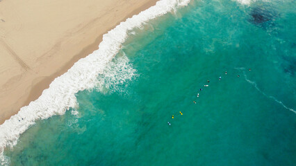 Drone view of surfers in Ericeira, Portugal
