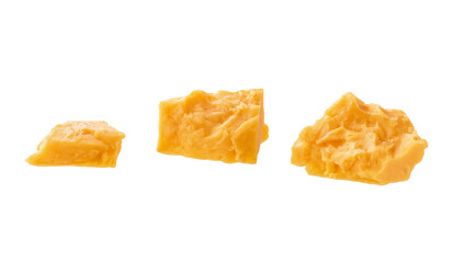 cheddar cheese cubes isolated on a white background.