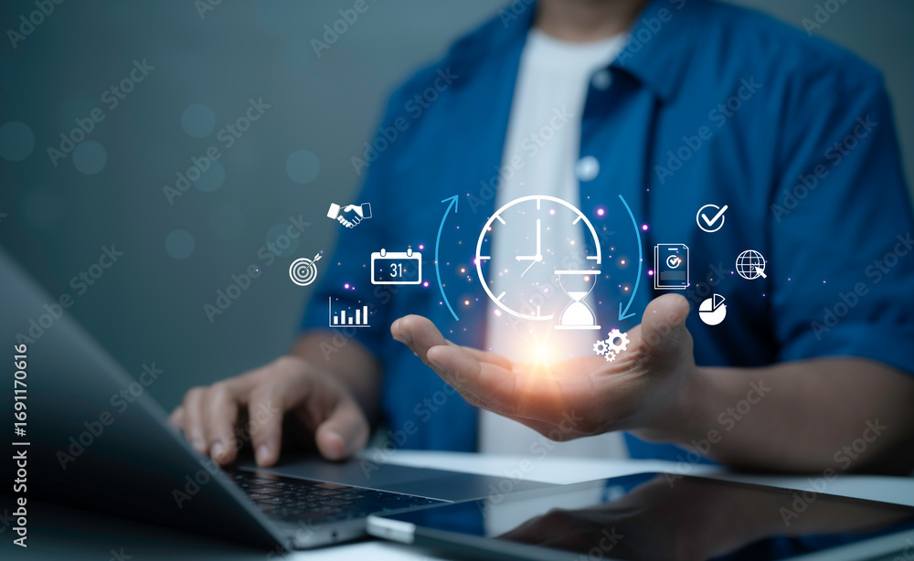Poster person using laptop with glowing holographic clock and productivity icons representing time manageme