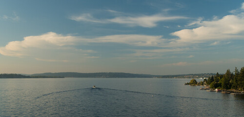 Wide wake behind motor boat travelling from Medina to Kirkland