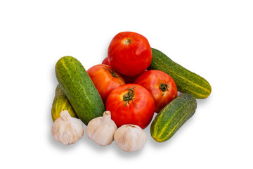 Still life with tomatoes, cucumbers and garlic, isolated on white background