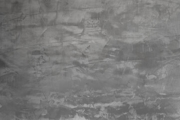 gray background, photo shows texture of plastered concrete wall close-up