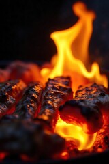 Close-up of vibrant, flickering grill flames licking at the cooking surface, intense heat and orange glow Perfect for BBQ, cooking, summer, food concepts , embers, orange