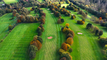 Drone view of autumn golf course in Germany.
