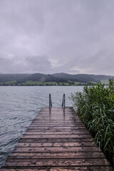 Naklejka premium Rainy day in Irrsee. Austria. Irrsee a lake in the Salzkammergut, Austria near the town of Zell am Moos.