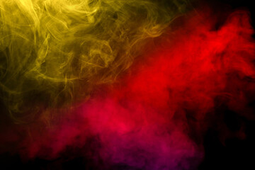 Yellow and pink steam on a black background.