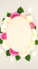 Oval wooden board framed by roses and leaves