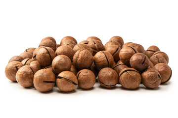 Macadamia nuts in a shell isolated on a white background.