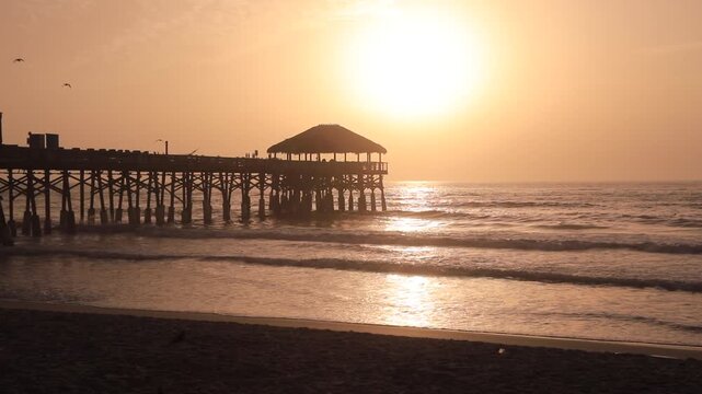 Cocoa beach in Florida on early morning with the pier 
