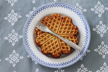 Scandinavian waffles on a white and blue plate