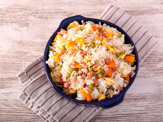 Yangzhou fried rice with egg, ham, peas and carrot