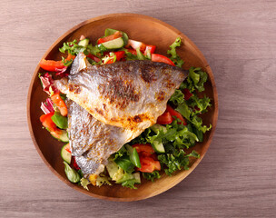 sea bream fish with salad