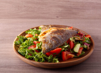 sea bream fish with salad