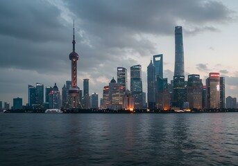 Obraz premium Shanghai Skyline at Dusk Oriental Pearl Tower and Skyscrapers on Huangpu River, China.