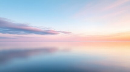 Fototapeta premium Serene sunset reflecting on calm water, creating a beautiful and peaceful atmosphere in soft pastel colors.