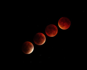 Naklejka premium Blood moon lunar eclipse sequence against a star-filled night sky.
