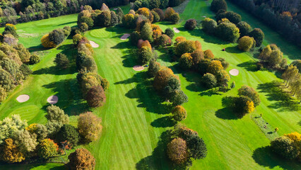 Drone view of autumn golf course in Germany.