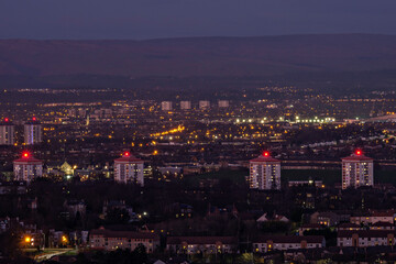 Night view over Paisley from Gleniffer Braes Country Park, Strathclyde, Scotland.