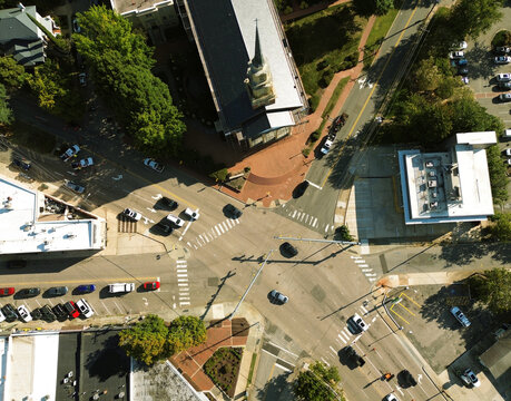 Cars navigating traffic at the 5 Points intersection in the Hayes Barton area of Raleigh North Carolina