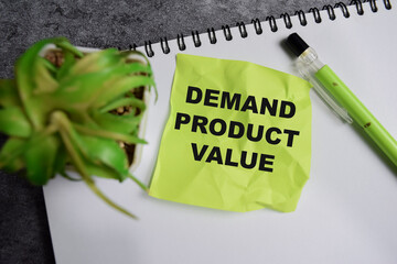 Concept of Demand product value write on sticky notes isolated on Wooden Table.