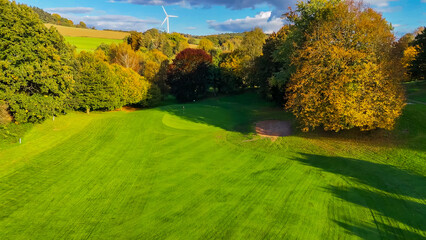 Naklejka premium Drone view of autumn golf course in Germany.