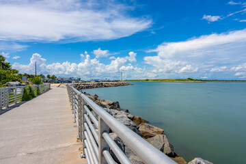 Jetty Park Pier at Port Canaveral Florida. Long exposure for motion blue in sky and water