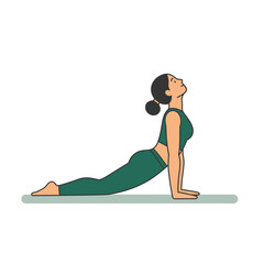 Woman practicing upward facing dog yoga pose on mat in studio, stretching body and improving flexibility with mindful exercise, promoting wellness.