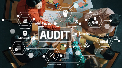 Team members engage in a collaborative audit process, discussing findings and compliance within a...