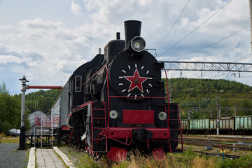 A beautiful Vintage Soviet Steam Locomotive proudly showcased at the Train Station