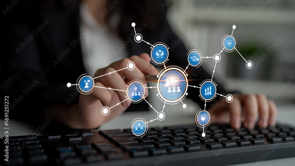 Poster a business professional engages with a digital interface featuring various network icons. this image