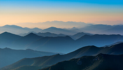 Obraz premium Layered Mountain Range In Soft Light With A Gradient Sky Backdrop
