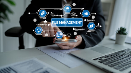A person using a smartphone to engage with a modern file management system featuring various icons related to cloud storage and backup. Ideal for tech-focused projects. Tessel